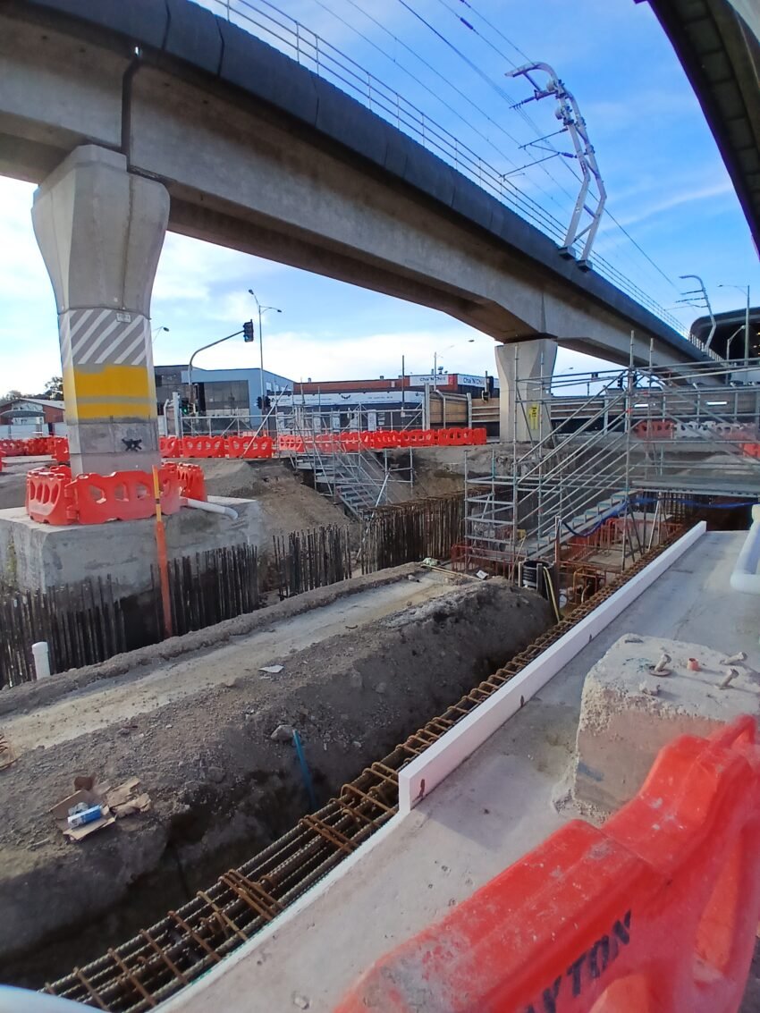 Suburban Rail Loop East construction site at Clayton, Melbourne, showing station works during a Travaux site visit examining large-scale project delivery.